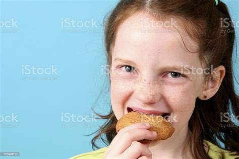 Biting A Cookie Stock Photo Download Image Now 8 9 Years Baking