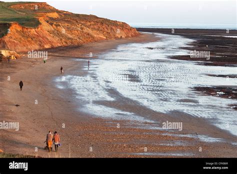 People Strolling On Brooke Beach Near Hanover Point South West Coast