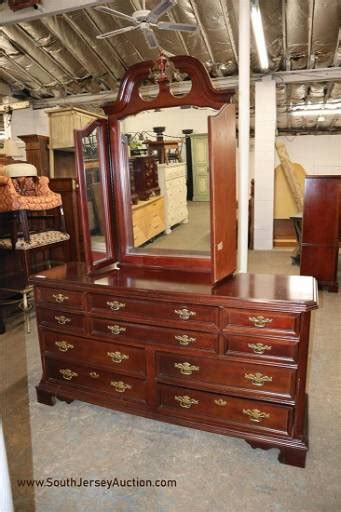 Basset Mahogany Finished 10 Drawer Low Chest With Tri