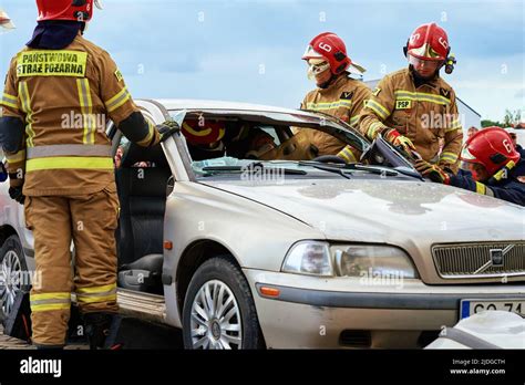 Firefighters During A Rescue Operation Training Rescuers Unlock The