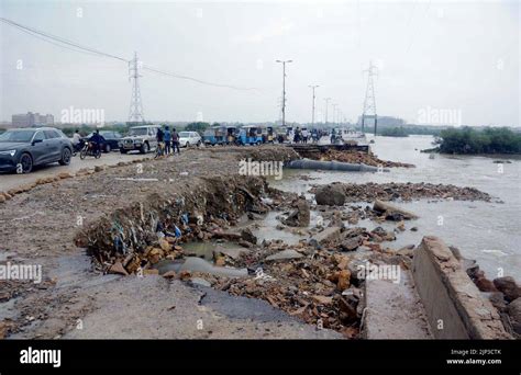 View Of Destruction At Korangi Crossing Road Due To Stagnant Rainwater