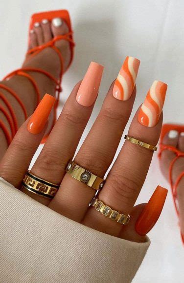 40 Awesome Nail Ideas You Should Try Peach And Orange Swirl Coffin Nails