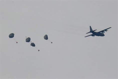 Military Planes From Four Countries Drop Humanitarian Aid On War Torn