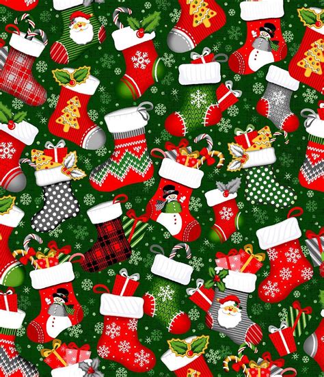 Christmas Stockings And Presents On Green Background