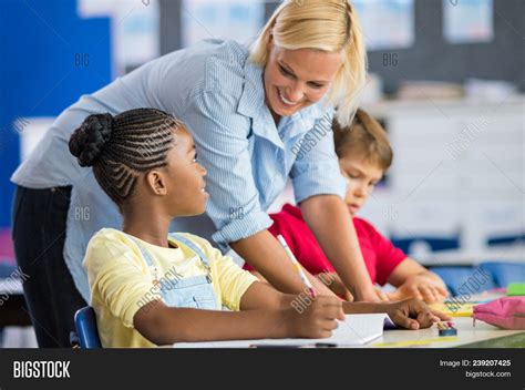 Happy Teacher Helping Image And Photo Free Trial Bigstock