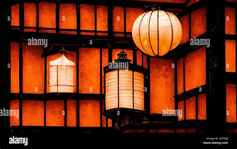 Japanese Lanterns In Front Of Traditional Paper Door Style Background