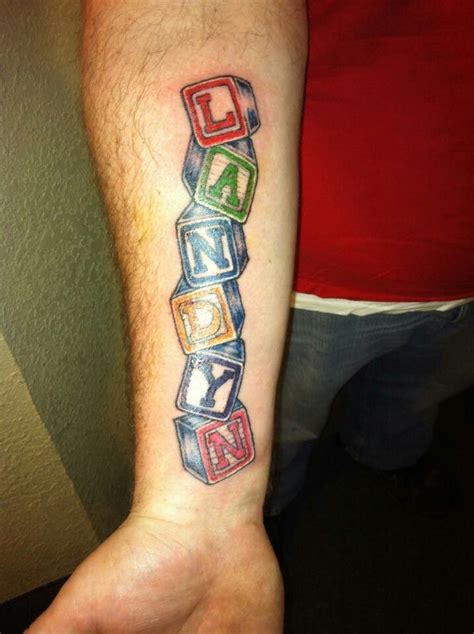 Tattoo of kids blocks with letters spelling name | Baby tattoos, Tattoos for daughters, Tattoo ...