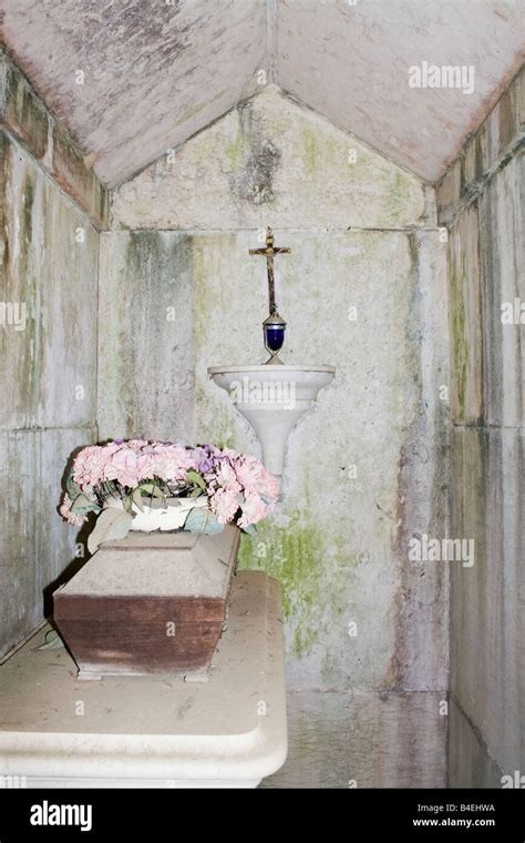 Interior Of A Catholic Mausoleum With An Old Childs Coffin In A