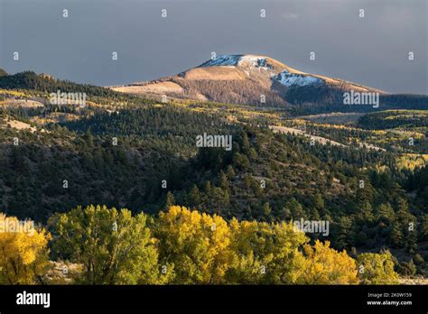 Early Fall snow with autumn colors on Del Norte Peak in the Rio Grande ...