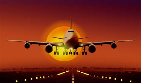 Plane Landing At Sunset