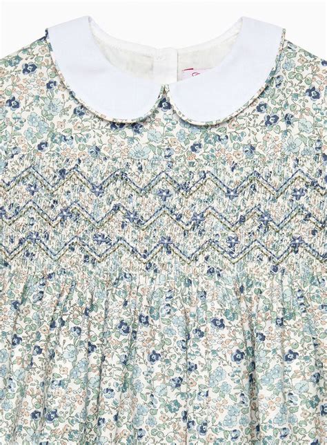 Girls Arabella Smocked Dress In Blue Floral Trotters London