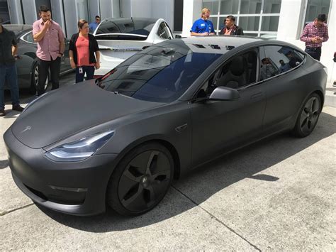 Tesla Model X Black Satin Gold Dust Vinyl Wrap With Carbon Fiber