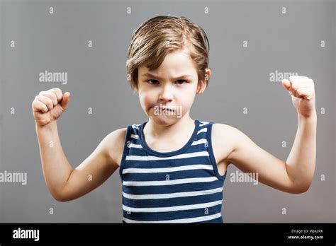 Boys Showing Muscles Hi Res Stock Photography And Images Alamy