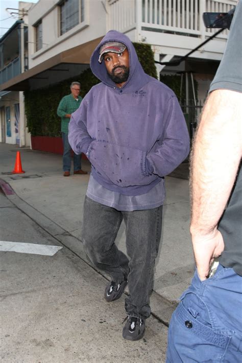 Kanye West Wears Ripped Purple Hoodie To Lowkey Dinner In Santa Monica