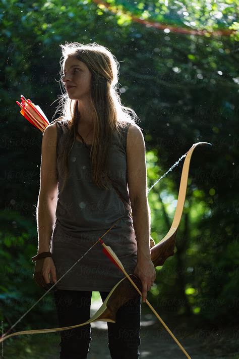 Portrait Of Woman With Bow And Arrows By Stocksy Contributor Michela