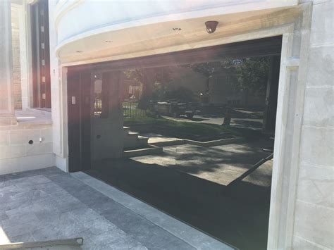 Glass Garagae Doors Installation Project | Centauri Doors