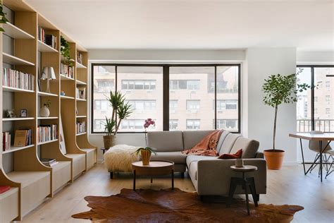 The Built-In Bookcase in This NYC Home Serves as Seating and Kitchen Storage