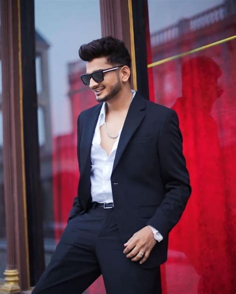 PICS: Munawar Faruqui Looks Dapper in a Black Suit | Whosthat360