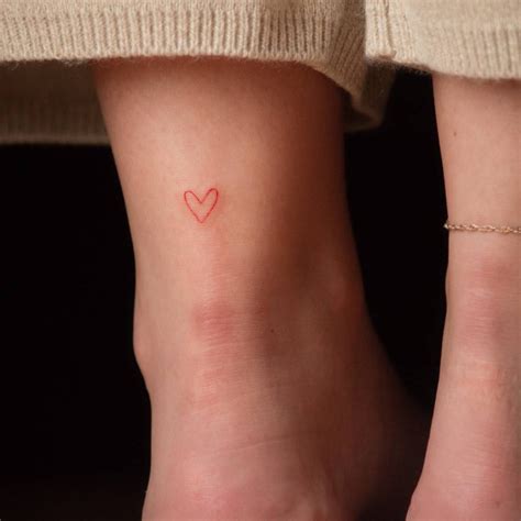 Minimalist red heart tattoo | Red heart tattoos, Tiny heart tattoos, Heart tattoo