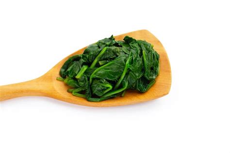 Premium Photo Boiled Spinach On White Background