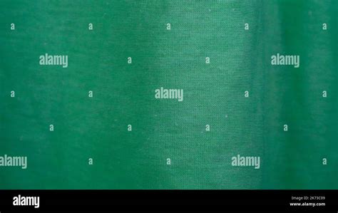 Green cloth texture as background Stock Photo - Alamy