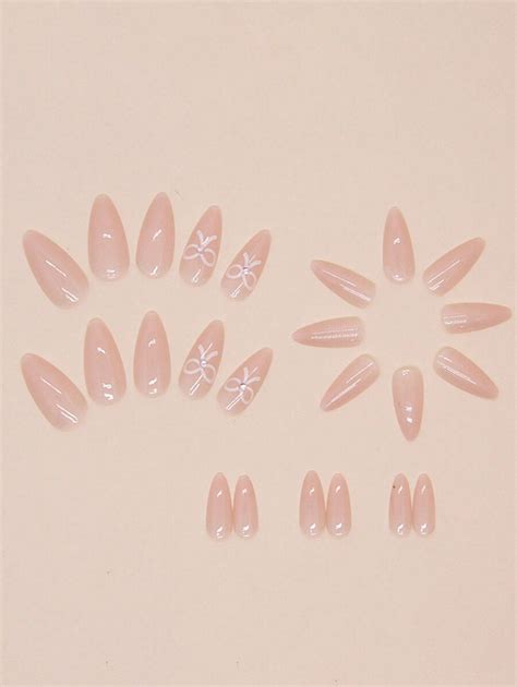 Medium Almond Shaped Nude Color Glossy Transparent Bow Knot Design