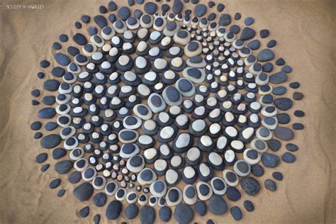 Land Artist Creates Ephemeral Stone Art on the Shores of the U.K.