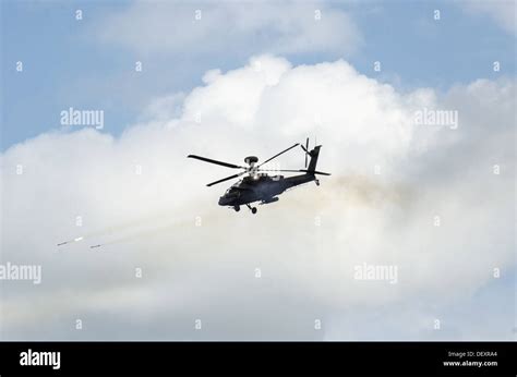 A U S Army AH 64 Apache Helicopter Crew Assigned To The 48th Infantry