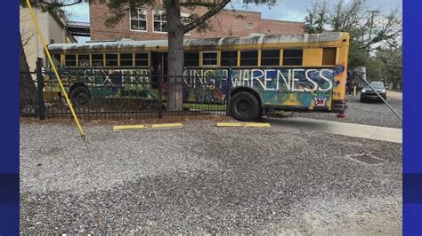 Graffitied School Bus Crashes Into Covington School Fence