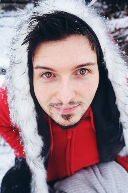 Premium Photo Portrait Of Man Standing In Snow