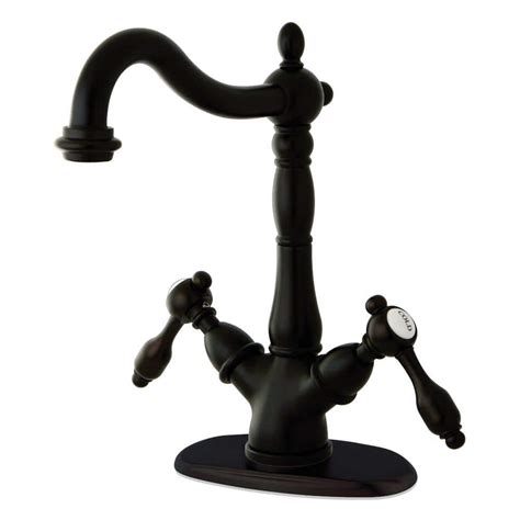 Kingston Brass Tudor Double Handle Vessel Sink Faucet In Oil Rubbed