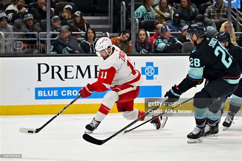 Filip Zadina Of The Detroit Red Wings Controls The Puck During The