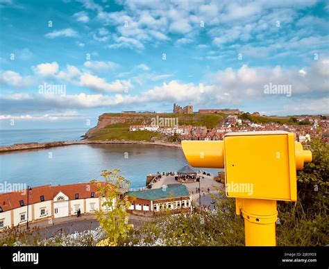 View Of Whitby Harbour With Tourist Telescope Stock Photo Alamy