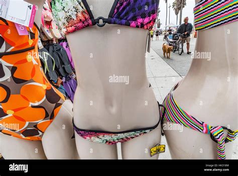 Three Woman Mannequins Modeling Brightly Colored Bathing Suits For Sale