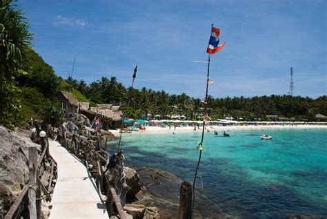 Vibrant Beach Scene With People Enjoying The Sand And Sea In Phuket