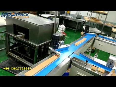 Revolutionary Cake Feeding And Packing System Fully Automated And