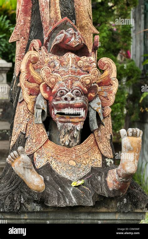 A Traditional Balinese Hindu Stone Demon Statue At Taman