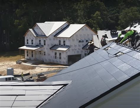 Tesla Solar Roof Musk Builds Sustainable Communities With Photovoltaic Tiles Blending In With