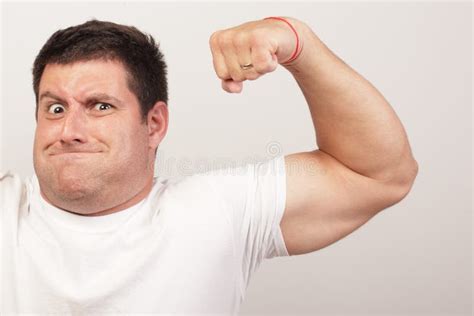 Man Flexing His Arm Stock Photo Image 21646470