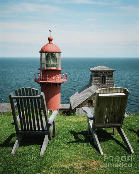 Chairs And View Of Pointe à la renommee Lighthouse Gaspe Quebec