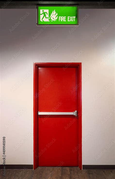 Fire exit door. Fire exit emergency door red color metal material with alarm and emergency light ...