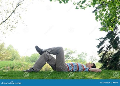 Man Lying On The Grass Stock Image Image Of Green Relaxation 2360621