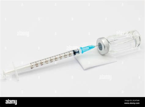 Medical Syringes And Needles For Hypodermic Injection On A Marble