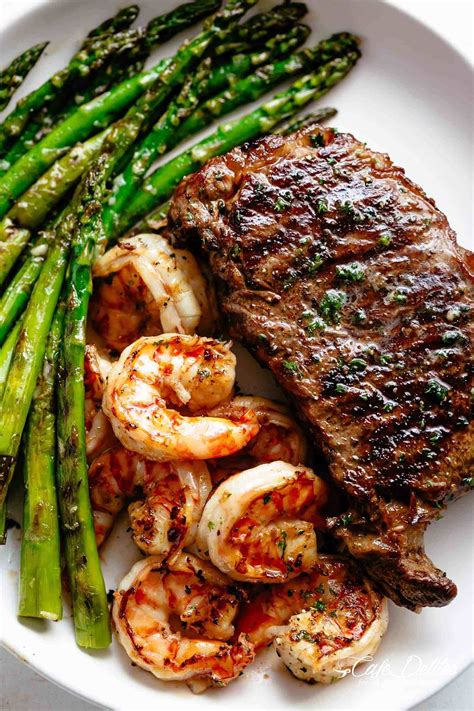 Steak And Shrimp Slathered In Garlic Butter Makes For The Best Steak