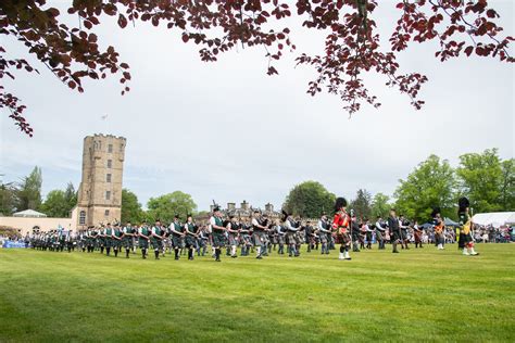 Drum Major Derek Dean Leads Massed Pipe Bands At Gordon Castle Highland