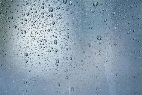 Textura De Una Gota De Lluvia Sobre Un Fondo Transparente Mojado De