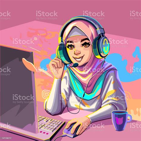 Muslim Girl Gamer Or Streamer In A Hijab And A Headset Sits At A