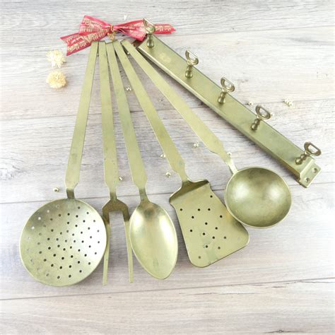 Old Brass Kitchen Utensils Suspension Of French Utensils Brass Spoon