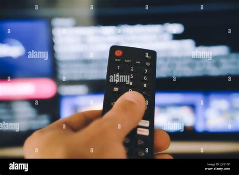 Hand Holding Tv Remote Hi Res Stock Photography And Images Alamy