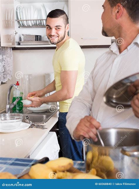 Two Men Cooking At Home Stock Photo Image Of Person 60368840